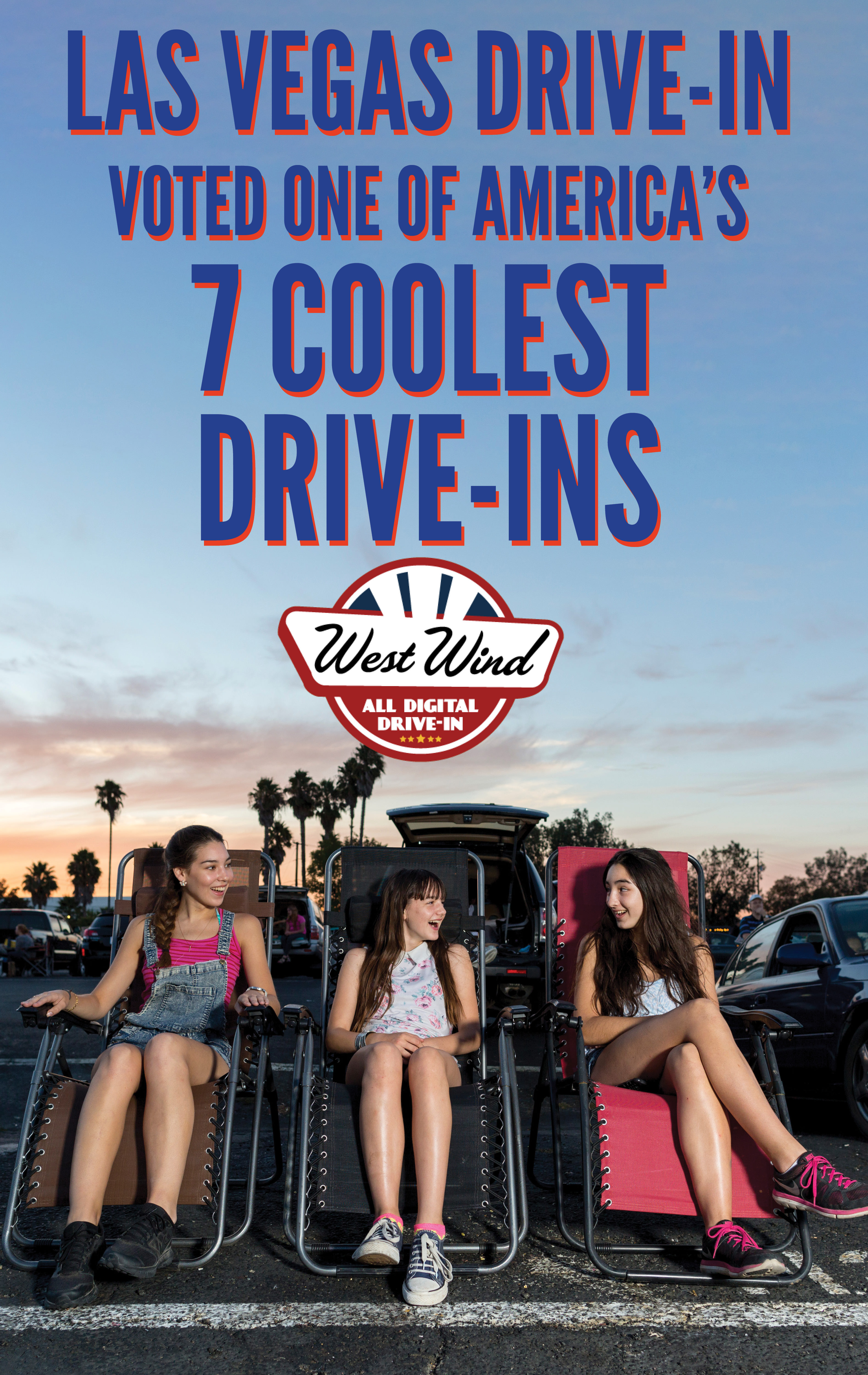 3 girls sitting in lawn chairs watching a drive-in movie